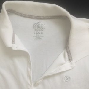 DONATED Women’s Izod polo shirt with logo
